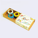 Decorative box with colorful tape rolls and a floral design on the lid.