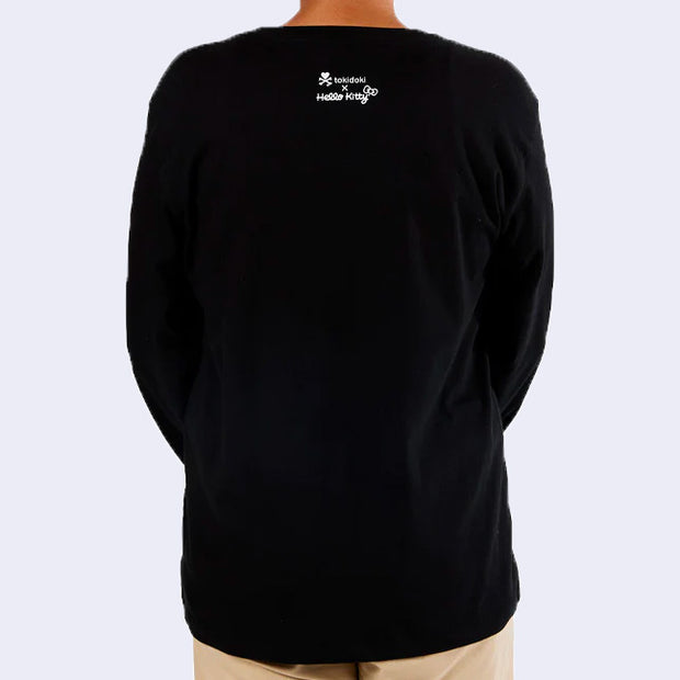 Back of a black long sleeve shirt, with a small "tokidoki x Hello Kitty and Friends" logo in the upper center.