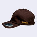 Brown cap with a yellow-orange ginkgo leaf in the middle. "Giant Robot" is written in cursive along the side of the cap.
