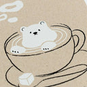 Illustration of a polar bear in a coffee cup with latte art on a brown background
