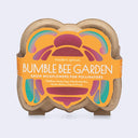 Packaged product for a 'Bumble Bee Garden' with colorful design on a white background