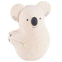 White wooden figurine of a koala, smiling with a cute cartoon facial expression.