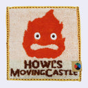 Small square towel with a design of Calcifer from Howl's Moving castle, with the name of the film also written on the towel.