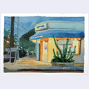 A watercolor painting of a street corner with a small blue and yellow storefront, a cactus in the foreground, and a dark tree trunk on the left, shown on a white paper background.