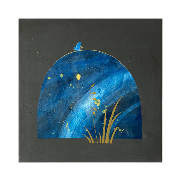 Collage style painting on dark gray canvas of a large rounded top rock, blue with white marbling and gold splatters. A small blue butterfly sits atop the rock and some blades of grass are in front.