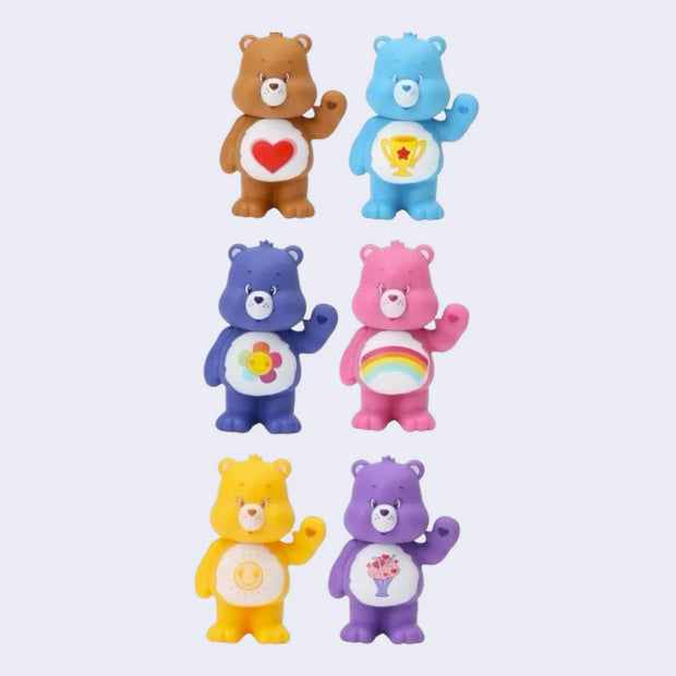 Set of six colorful Care Bears on a light purple background