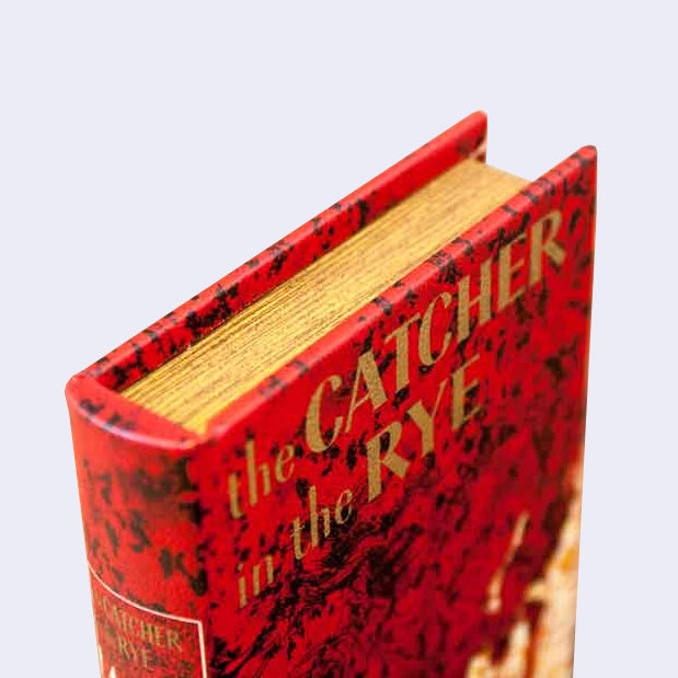 Corner view of hardcover book made to look like "The Catcher in the Rye"