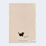 Backside of notebook, beige with a tiny black cat standing next to a fish plush.