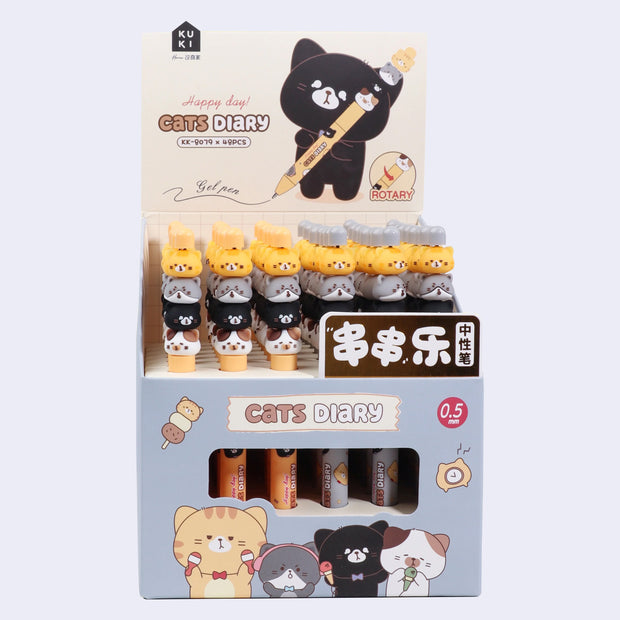 Display case of 48 gel pens with cat heads stacked atop of one another as the pen body.