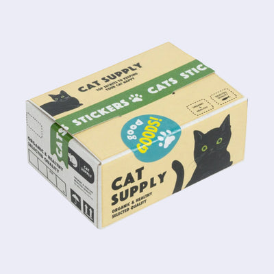  Box of stickers, made to look like a cardboard shipping box holding cat pet supplies, with labeling and illustrations on the exterior that mimic the real thing.