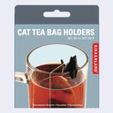 Packaging of Kikkerland Cat Tea Bag Holders with a cup of tea and a cat-shaped holder.