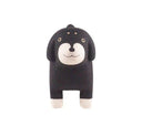 Black wooden figure of a dog on a white background