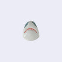 Ceramic pin of a shark head.