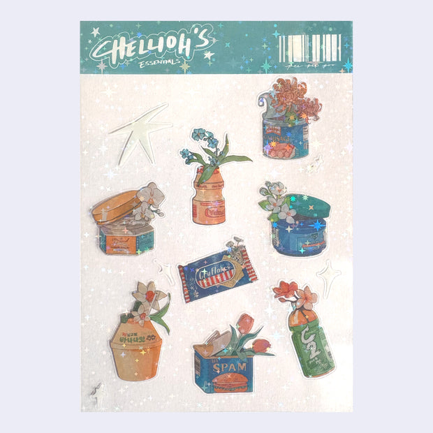 Sticker sheet with 9 different stickers, with muted blue and dark yellow coloring of flowers popping out of popular Asian snack and medicinal packaging - such as Spam, Yakult, Banana Milk, Tiger Balm, etc.