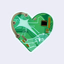 Die cut sticker of a heart-shaped green circuit board with holographic elements.