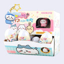 Chiikawa figurine set in a colorful box with cartoon characters on a white background