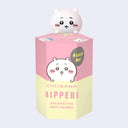 Decorative mini figure packaging with a cute character on a light purple background