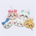 Five cartoon-style plush toys with different expressions on a light purple background
