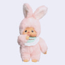 Plush toy dressed as a pink bunny with a white shirt on a light gray background