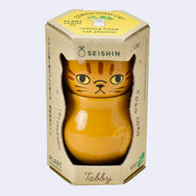Cat shaped planter with a separately attached head, enclosed in its product packaging.