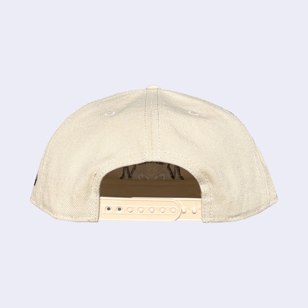 Beige cap on a light gray background