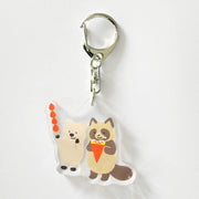 Keychain with cartoon raccoons on a white background
