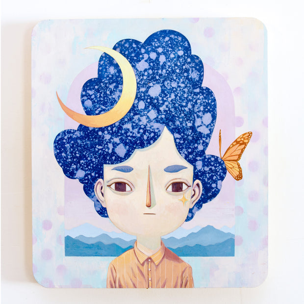 Painting of a person with large, fluffy blue and purple splatter painted hair. They wear an orange collared shirt and have a sparkle on their right cheek. A monarch butterfly rests on their hair and a crescent moon hangs in the top left.