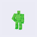 Green robot toy on a light gray background