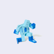 Wooden yeti character made of light and dark blue square-like shapes, standing in a dynamic pose.