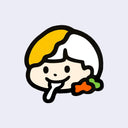 Sticker with a bold black outline of a character with curry atop its head, a spoon in its mouth and small veggies nearby.