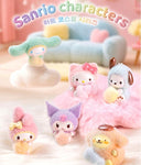 Set of fluffy Sanrio Characters in flocked pastel colored costumes, all holding small objects.