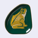 Green dish with a yellow frog design on a light gray background