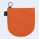 Orange pouch with a black zipper on a light gray background