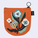 Small pouch with floral design on an orange background