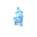 A small ceramic dog figurine with a light blue and white marbled pattern, featuring an open mouth showing pink mouth, white teeth, set against a plain white background.