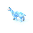A small ceramic dog figurine with a light blue and white marbled pattern, featuring an open mouth showing pink mouth, white teeth, set against a plain white background.
