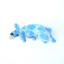 A small ceramic dog figurine with a light blue and white marbled pattern, featuring an open mouth showing pink mouth, white teeth, set against a plain white background.
