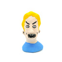 A small sculpted bust figure of a cartoon-style man with bright yellow hair, a beige face, black facial details, and a blue shirt on a plain white background.