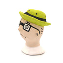 A handcrafted clay figurine of a man's head wearing a bright lime green hat and black-rimmed glasses with white circular lenses, set against a plain white background.