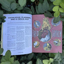 Open magazine spread of an article on crockpot cooking with an accompanying illustration of a chicken on fire.