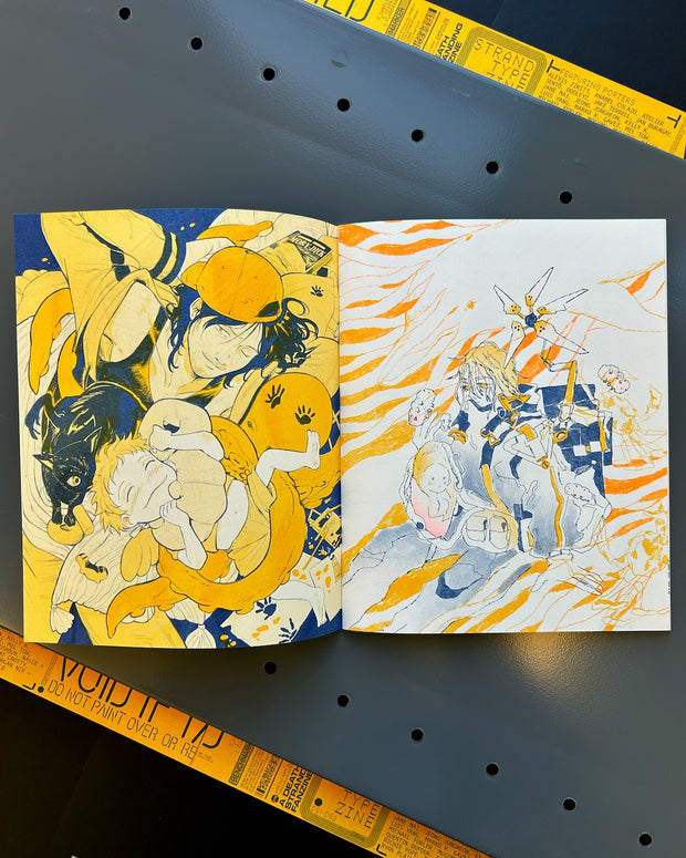 Open book with colorful illustrations on a dark surface