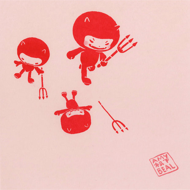 Simplistic red illustration on pink paper of 3 small devils, with large heads and pitchforks. They smile and 2 of them sit on the ground.