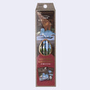 Packaged product with dinosaur illustration on a light gray background
