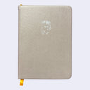 Brownish gray pleather covered sketchbook with a small embossment of a robot carrying a flag that reads "Giant Robot" in the upper center. 