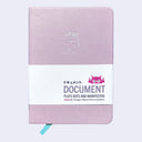 A light pink hardcover notebook with a white paper band around the middle. The band features the title 'DOCUMENT' and Japanese text, along with a small white robot logo.