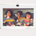 Painting of a film still from The Doom Generation of 3 people sitting in a car, a woman with red lipstick and sunglasses drives and there's a man in the passenger and back seat. The dashboard of the car is covered in trash.