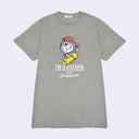 Gray t-shirt with an illustrated graphic of Doraemon, a blue earless cat character, wearing a backwards red hat and riding a yellow skateboard. Text reads "I'm Doraemon plays skateboard"