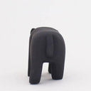 Wooden figurine of a black panther, with a growling expression.