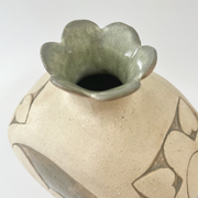 Overhead view of vase, showing a sage green glaze on the interior.