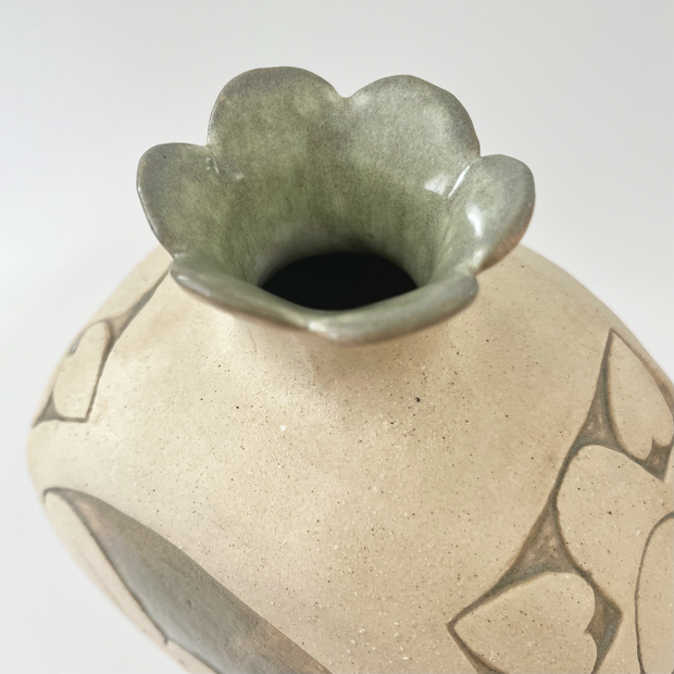 Overhead view of vase, showing a sage green glaze on the interior.